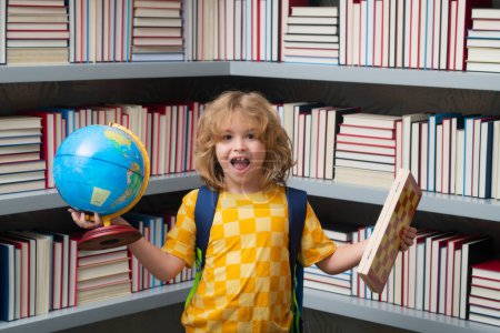 Photo for Excited pupil. School boy with world globe and chess, childhood. Little student school child. Portrait of nerd student with school supplies - Royalty Free Image