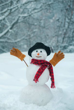Photo for Christmas snowman on white snow background. Winter background with snowflakes and snowman. Snowman on the background of stars and snowflakes. - Royalty Free Image