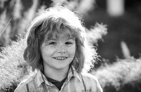 Photo for Cute child portrait. Happy boy child is smiling enjoying life. Portrait of young boy in nature, park or outdoors. Concept of happy family or successful parenting - Royalty Free Image