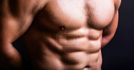 Photo for Muscular body. Muscular man. Male body, muscle shape, strong man. Athletic man posing shirtless. Gay with naked torso. Muscular model. Sport men body concept. Muscular power. Strong and sexy - Royalty Free Image