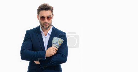 Photo for Business man in t-shirt with cash money dollars banknotes isolated on yellow studio background. Hundred dollar bill, financial concept - Royalty Free Image
