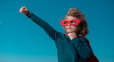 Photo for Superhero child boy concept for childhood, imagination and aspirations. Concept of boy power - Royalty Free Image