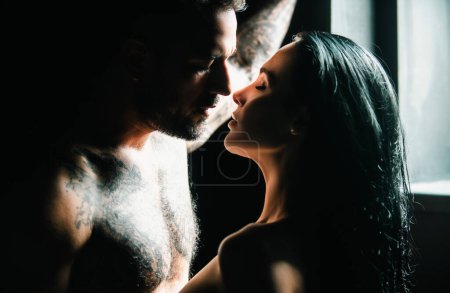 Photo for Couple in love. Close up portrait of a amazing coupl embracing. Romantic couple. Passionate couple sharing romantic moments. Man kissing and hugging beautiful woman. Tenderness lovers kissed - Royalty Free Image