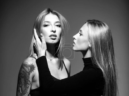 Photo for Lesbians lgbt couple. Two girls with beautiful eyes, nice lips. Natural and healthy women. Perfect eyebrows and lashes. Lgbt, tolerance, lesbians couple love concept - Royalty Free Image