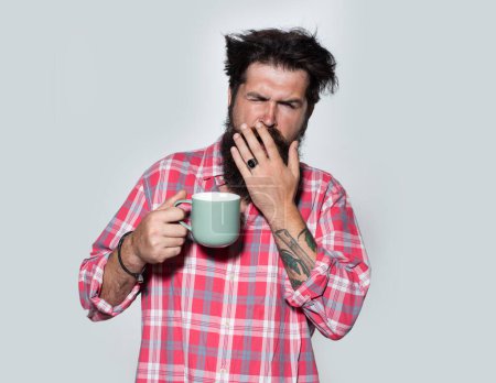 Photo for Happy morning. Mans holds cup of coffee. Morning tea. Good morning. Man with tea cup. Hipster man with cup of coffee. Bearded man smiling hold mug tea. Wake up. Happy day. After morning tea - Royalty Free Image