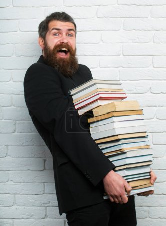 Photo for Funny teacher or professor with book stack. Thinking serious mature teacher. Mature professor, middle aged teacher, bearded fun man. Study concept. Teachers day - Royalty Free Image