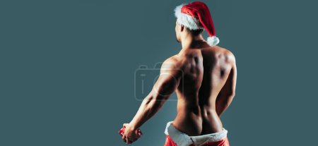 Photo for Back of men gay in santa hat. New year strip and gifts for adults. Muscle gay at xmas. Santa gay with muscular body. Christmas party and sex games. Handsome sexy santa fo gay club banner - Royalty Free Image