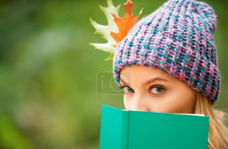 Photo for Fall season mood. Autumn woman writer. Writing on notebook in park - Royalty Free Image