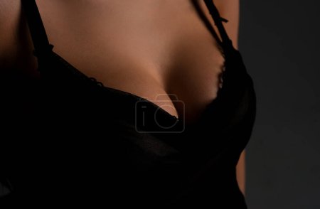 Foto de Women sexy breasts. Breas, boobs in bra, sensual tits. Beautiful slim female body. Lingerie model - Imagen libre de derechos