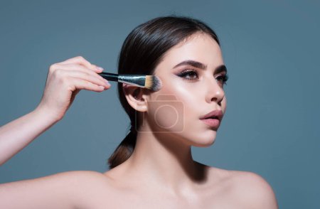 Photo for Beauty Makeup and cosmetics. Woman with makeup brush. Visage. Skincare treatments - Royalty Free Image