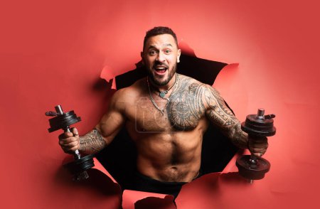 Photo for Man power. Excited guy with dumbbells. Sport man doing biceps lifting in studio. Athletic guy doing exercise. Banner sport - Royalty Free Image