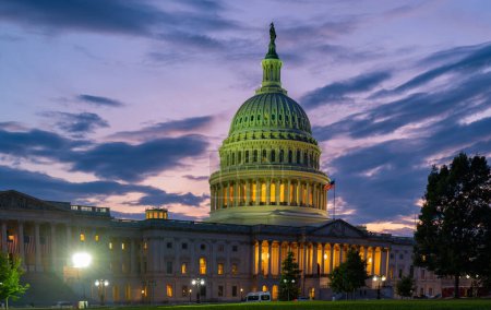 Photo for Capitol building at night, Washington DC. U.S. Capitol exterior photos. Capitol at sunset. Capitol architecture - Royalty Free Image