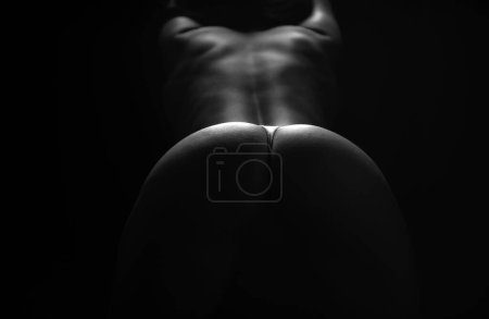 Foto de Woman posing in sexy lace underwear on beautiful ass buttocks. Erotic lingerie. Beauty model ass in a bikini on butt - Imagen libre de derechos