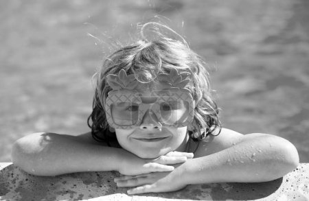 Photo for Children relax in the swimming pool. Summer kids activity - Royalty Free Image