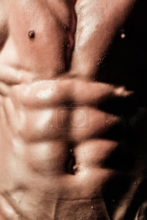 Photo for Close up Strong Muscular Male chest and Abs. Chest muscles. Muscled male torso with abs. Power Chest. Muscular body, Chest and six pack abs closeup. Muscular model. Sensual and sexy - Royalty Free Image