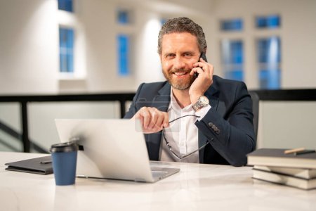 Photo for Business man entrepreneur startup owner in modern office. Occupation person in work space. Business portrait. Confident business worker. Business man talking on phone at office workplace - Royalty Free Image