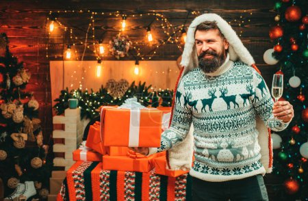 Photo for New year christmas concept. Santa in home. Happy new year. Christmas Celebration holiday. Bearded man in Christmas sweater - Royalty Free Image