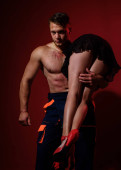 Romantic couple. muscular macho. athletic man hold sexy woman with slim legs. couple in love. Secret ingredient is love. Love is more than just a game for two. fit body of muscular sportsman. Stickers #692629850