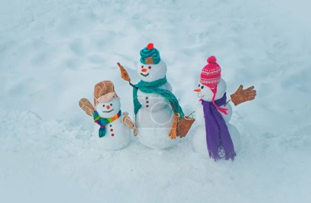Photo for Christmas snowman on white snow background. Winter scene with snowman on white snow background. Winter background with snowflakes and snowman - Royalty Free Image