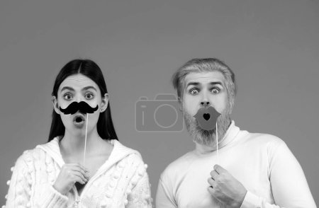 Photo for Gender discrimination and sexism. Male and female characters in gender symbols. Couple of woman with moustache and man with red lips. Identity transgender, gender stereotypes - Royalty Free Image