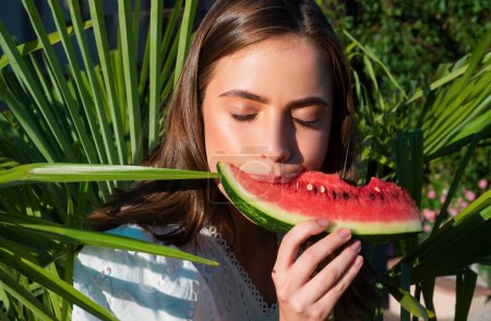 Photo for Sexy girl eating a watermelon. Outdoor portrait of beautiful young woman model. Summer sexy watermelon - Royalty Free Image