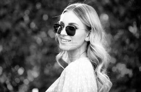 Photo for Spring romantic casual woman in sunglasses, portrait. Beautiful girl outdoor, close up beauty young female face. Young woman on sunny summer day - Royalty Free Image