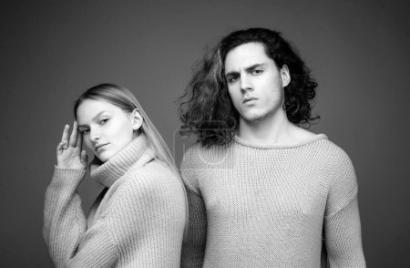 Photo for Fashion couple on beige background in studio. Couple of man with curly hair and blonde woman in hairdresser salon. Vogue Style. Youth, love and lifestyle concept - Royalty Free Image