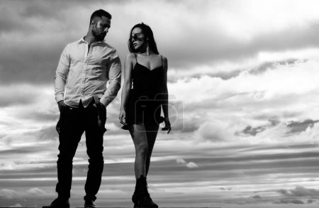 Photo for Young fashion lovers outdoor. Loving people, lovely couple in love. Sexy married couple, sensual husband and wife - Royalty Free Image