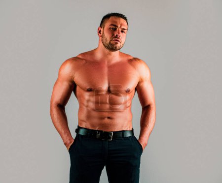 Photo for Muscular sexy man with a naked torso - Royalty Free Image