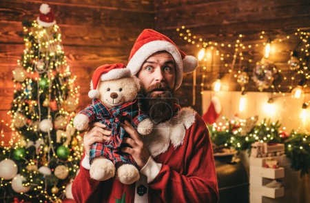 Photo for Hipster man, bearded Santa celebrate Thanksgiving day and Christmas. Bearded man in Christmas sweater. Home Christmas atmosphere - Royalty Free Image