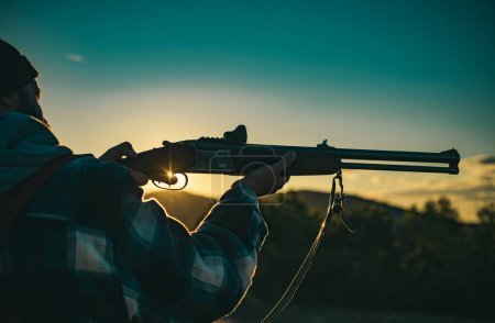 Photo for Hunting gun. Hunting without borders. Hunter with shotgun gun on hunt. Calibers of hunting rifles. Track down - Royalty Free Image