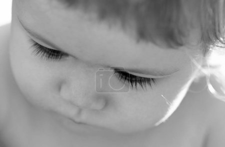 Photo for Kids portrait, close up head of cute baby child with long lashes, cropped face. Macro eyelash - Royalty Free Image