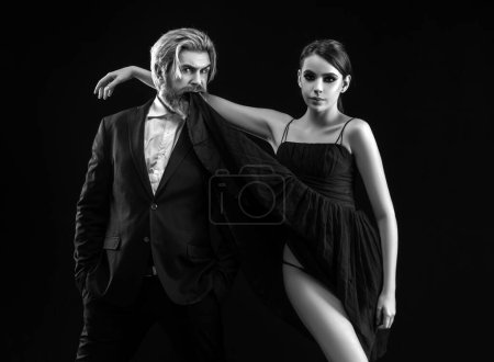 Photo for Elegant couple in the tender passion. Black background. Seductive love. Erotic desire - Royalty Free Image