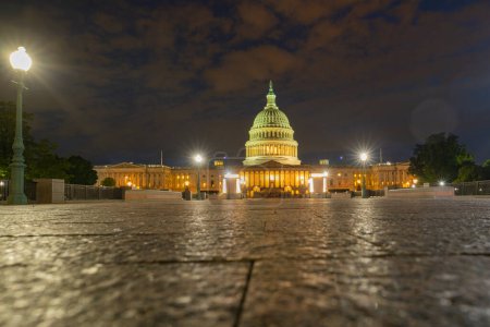 Photo for Capitol building at night, Washington DC. U.S. Capitol exterior photos. Capitol at sunset. Capitol architecture - Royalty Free Image