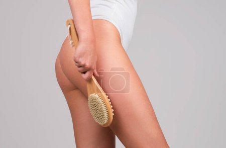 Foto de Beauty and health. Woman legs with clean skin. Female buttocks ass without cellulite. Skin treatment. Anti-cellulite body massage for leg and butt. Spa and wellness, body care, aesthetic cosmetology - Imagen libre de derechos