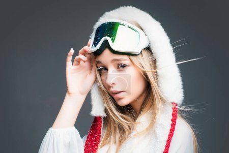 Photo for Winter, sport and woman concept. Young woman in ski goggles - Royalty Free Image