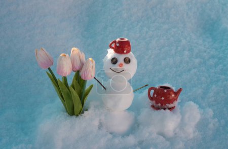 Photo for Winter snowman with flowers. Spring snow man with coffee cup - Royalty Free Image