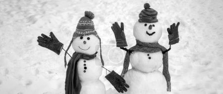 Photo for Christmas for couple of snowman. Snowman in love in the snow - Royalty Free Image
