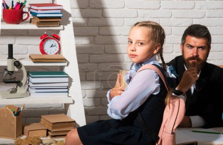 Photo for Teacher and school girl. Back to school preparation - Royalty Free Image
