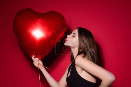 Photo for Love and valentines day symbol. Valentines card for Valentines Day. Valentine design. Happy Valentine. Valentines day, love heart. Valentine girl hold red heart. Beautiful woman celebrate valentines - Royalty Free Image
