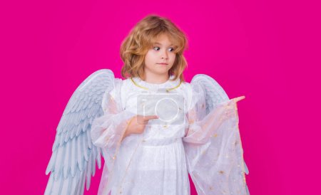 Photo for Love and valentines day symbol. Valentines card for Valentines Day. Valentine design. Happy Valentine. Child angel pointing finger, point gesture. Christmas kids. Little angel child with wings - Royalty Free Image