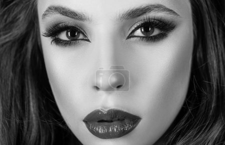 Photo for Closeup makeup with red lips. Smokye eyes. Cosmetics products - Royalty Free Image