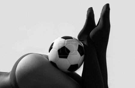 Photo for Woman sexy sport. Girl in soccer uniform with ball. Football fan. Female ass, butt - Royalty Free Image