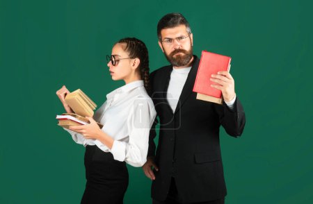 Photo for Portrait of teacher and young student teen girl, isolated. Student girl and teacher in school uniform. Education, high school and people concept - Royalty Free Image