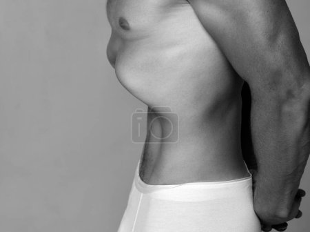 Photo for Male slim stomach. Fitness and healthy lifestyle. Males underwear. Naked Man torso - Royalty Free Image