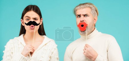 Photo for Concept of gender equality, equal rights for both sexes. Male female portrait. Funny couple of woman with moustache and man with red lips. Diversity, tolerance and gender identity concept - Royalty Free Image