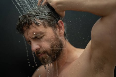 Photo for Portrait of man washing hair with shampoo taking shower. Washing hair with shampoo. Man washing hair with anti-dandruff shampoo, taking a shower. Hair care product, foam gel, shampoo and lotion - Royalty Free Image