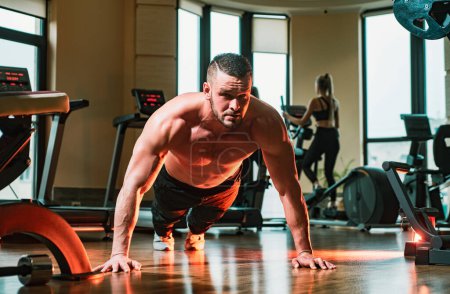 Photo for Power, strength and healthy lifestyle, sport. Sport man doing push ups exercise, pushup crunch - Royalty Free Image