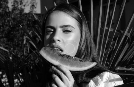 Photo for Portrait of a happy young woman with watermelon. Youth lifestyle. Happiness summer holiday. Tropical vacation travel concept. Happy young woman with watermelon in park - Royalty Free Image
