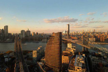 Photo for NYC from drone. Brooklyn Midtown skyline at dusk over Hudson River, NYC. Aerial Brooklyn Bridge in NYC. Top view of Brooklyn Buildings of New York. Historic Famous Brooklyn, NYC - Royalty Free Image